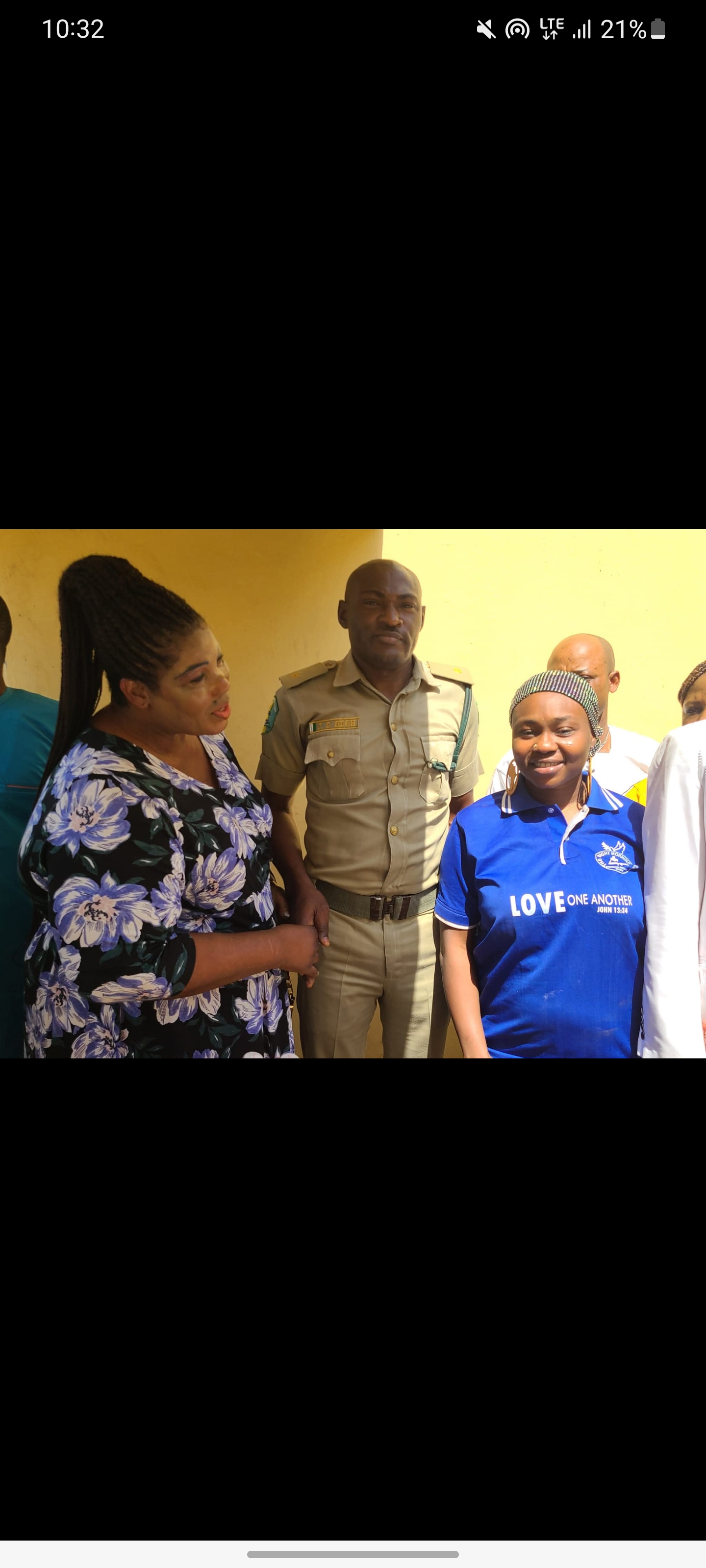 Close-up of team member interacting with a beneficiary