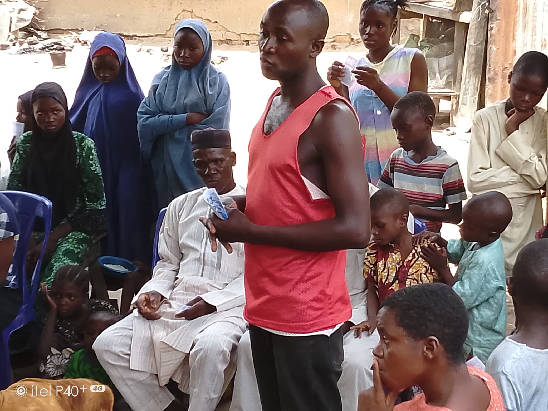 THPSF team member speaking to Zamani community members